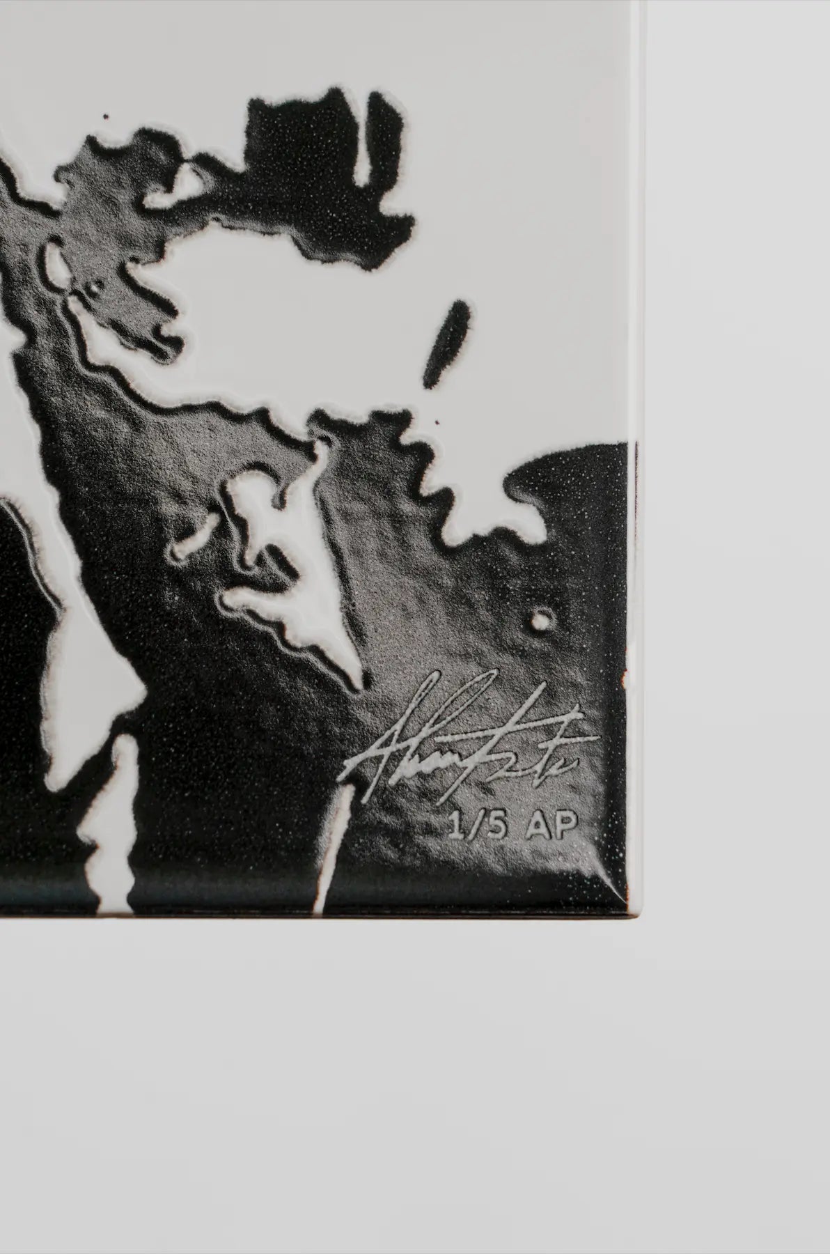 Close-up of Rasura limited edition ceramic tile by Clay showing fine portrait details – available exclusively on Clay