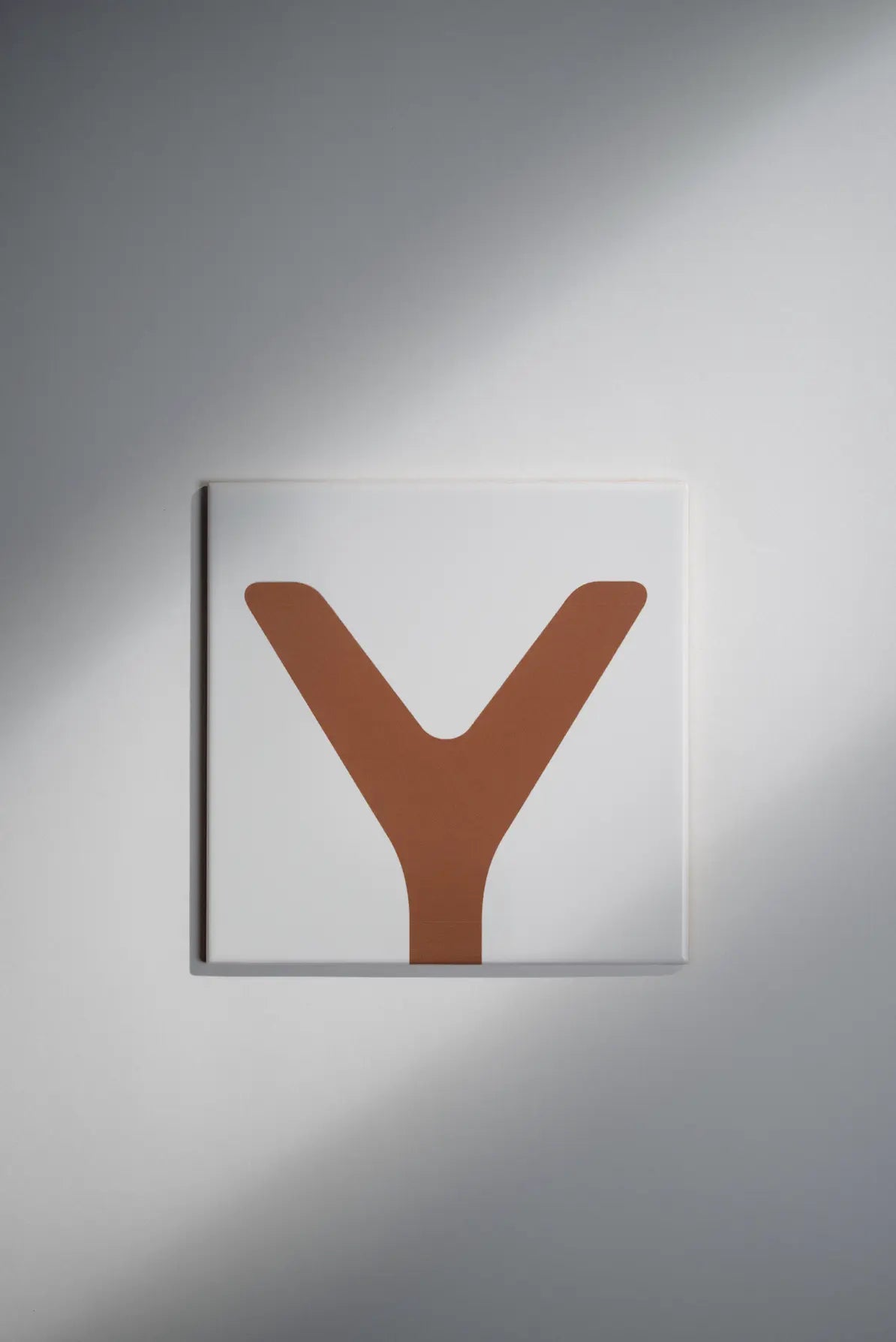 Pattern Clay Originals 4 ceramic tile by Clay in brown Y-shaped design – available on Clay