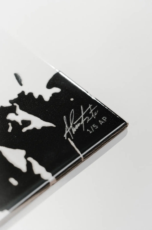 Side profile of Rasura ceramic art tile by Clay with laser engraved artist signature – on sale at Clay