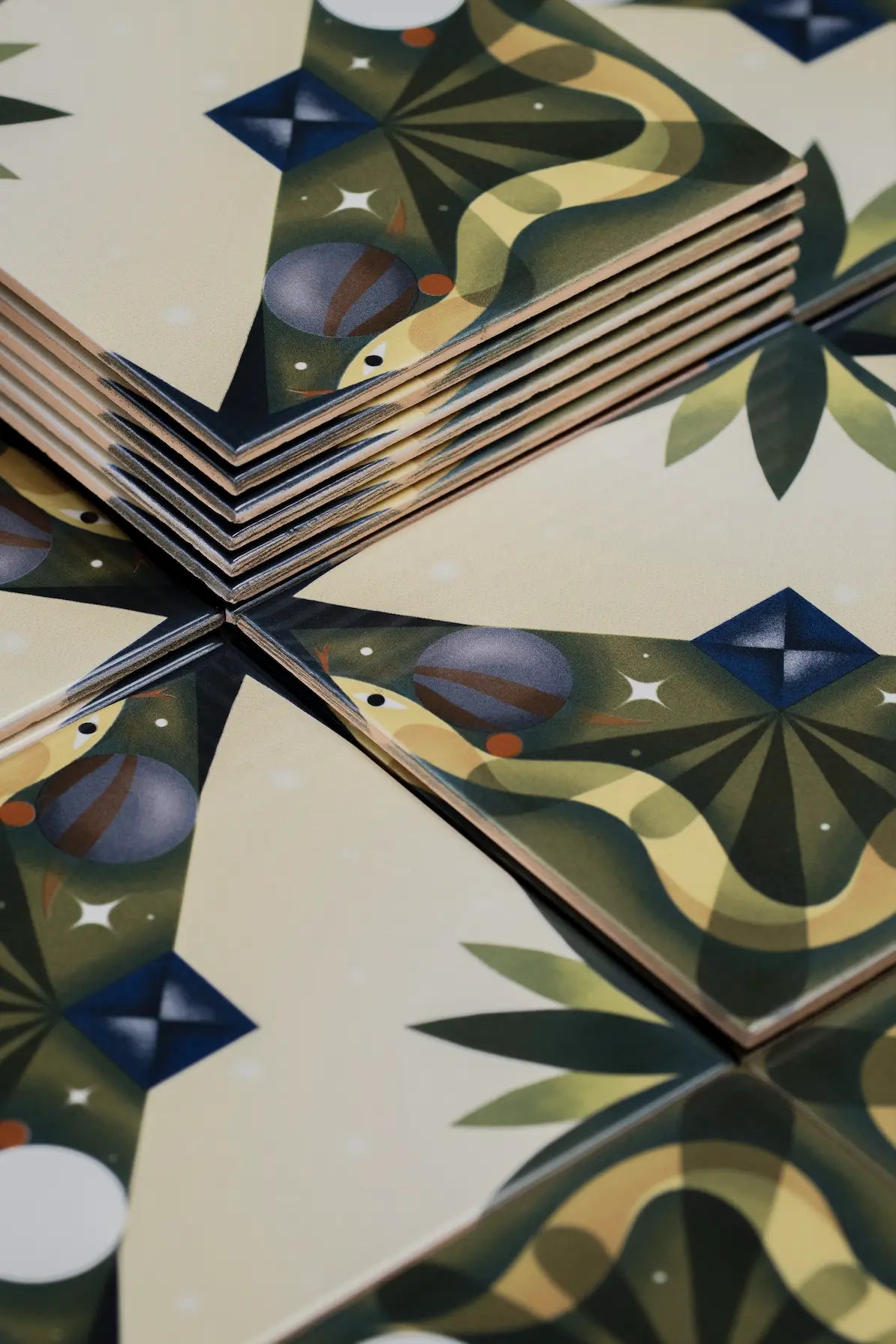 Serpente ceramic art tile by Clay showing engraved artist signature – available on Clay